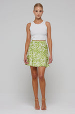 This is an image of Scarlett Skirt in Lotus - RESA featuring a model wearing the dress