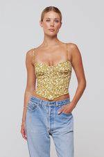 This is an image of Sienna Corset in Fava - RESA featuring a model wearing the dress