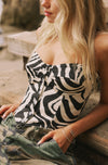 This is an image of Sienna Corset in Tigris - RESA featuring a model wearing the dress