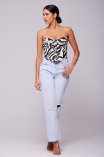 This is an image of Sienna Corset in Tigris - RESA featuring a model wearing the dress