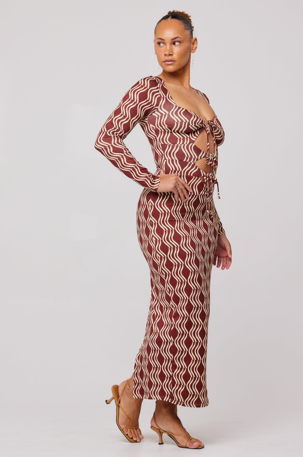 This is an image of Simone Dress in Coco - RESA featuring a model wearing the dress