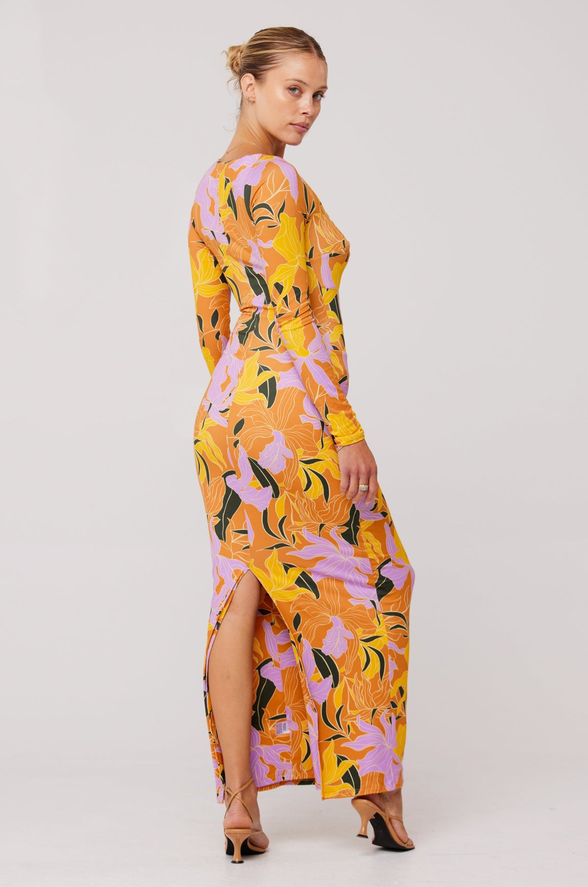 This is an image of Simone Dress in Doheny - RESA featuring a model wearing the dress