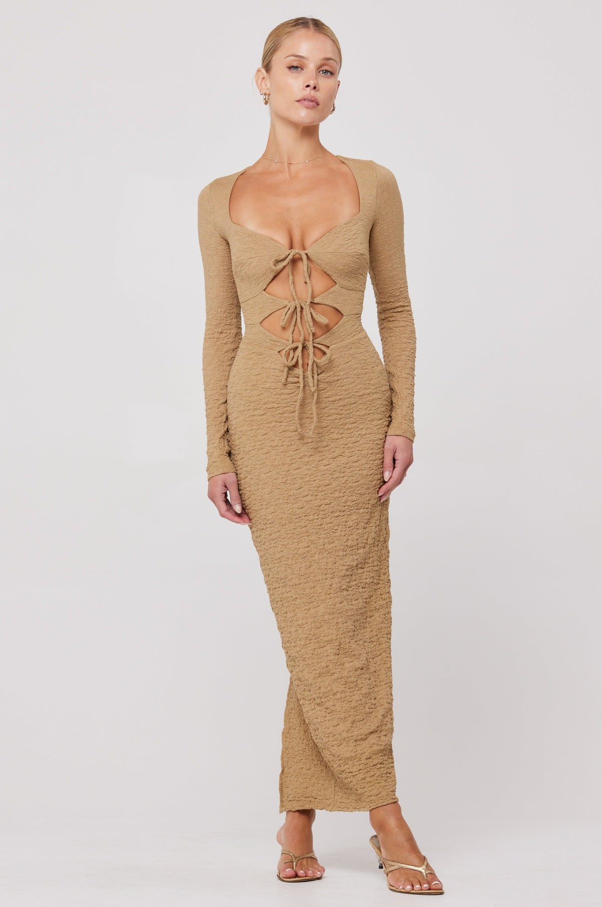 This is an image of Simone Dress in Moss - RESA featuring a model wearing the dress