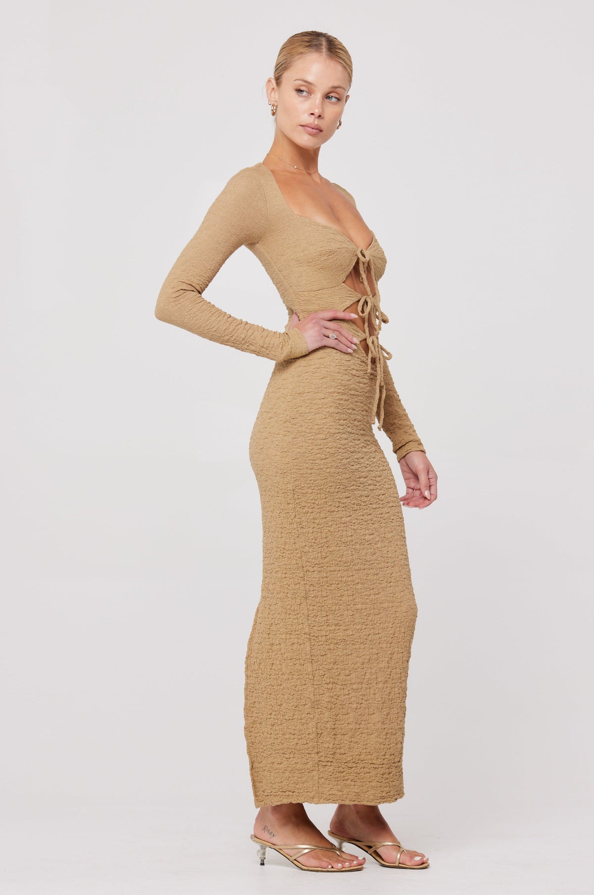 This is an image of Simone Dress in Moss - RESA featuring a model wearing the dress