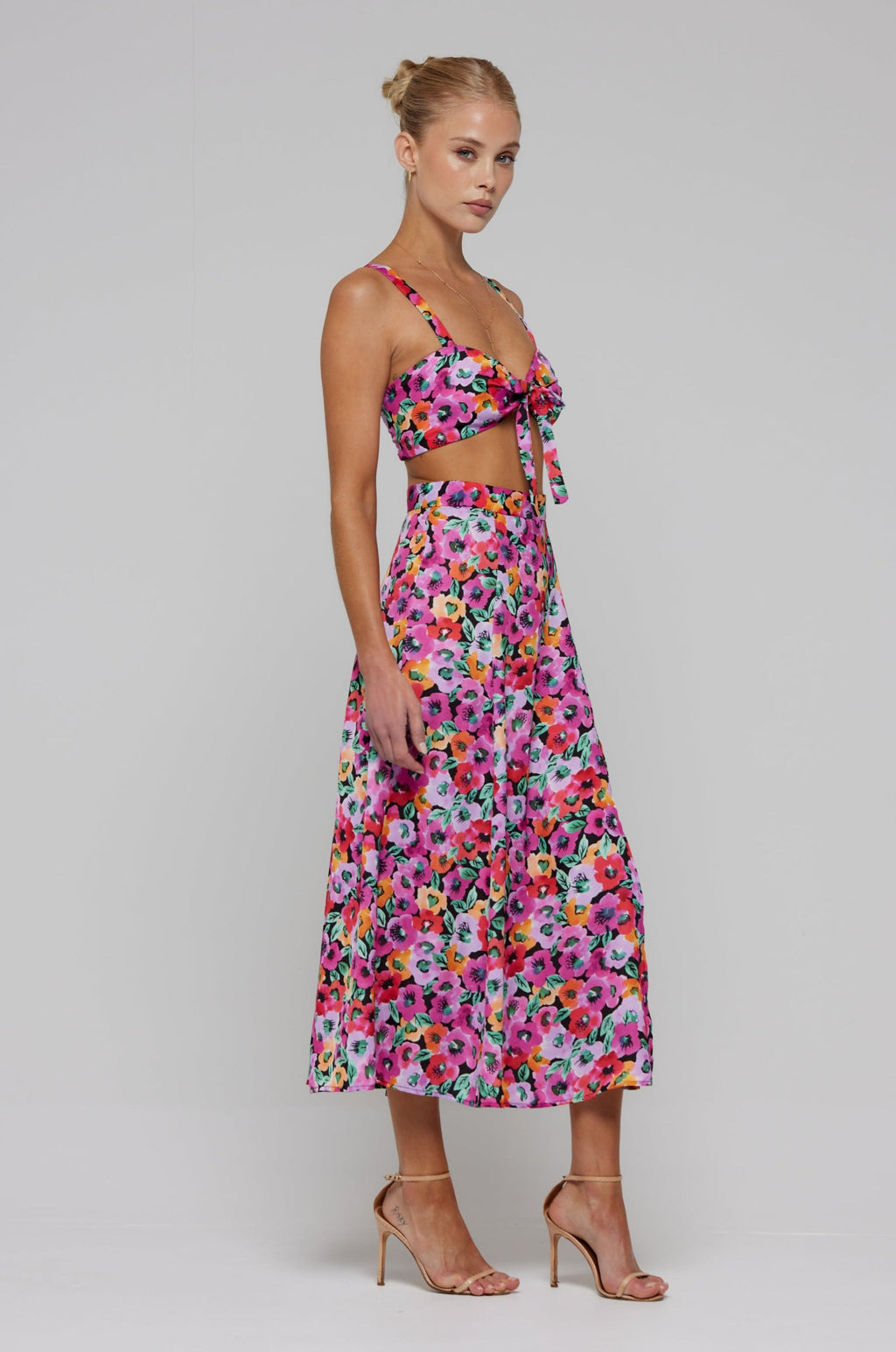 This is an image of Skatie Skirt in Dahlia - RESA featuring a model wearing the dress