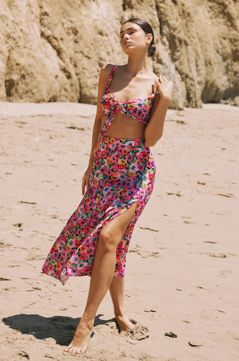This is an image of Skatie Skirt in Dahlia - RESA featuring a model wearing the dress