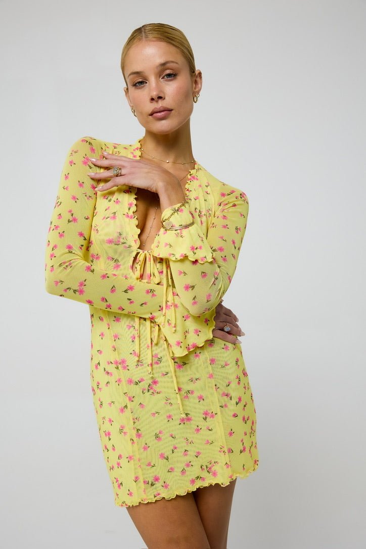 This is an image of Sloane Mini in Honey - RESA featuring a model wearing the dress