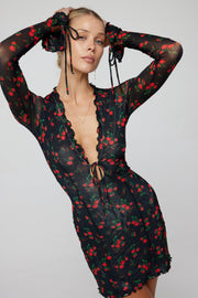 This is an image of Sloane Mini in Rosette - RESA featuring a model wearing the dress