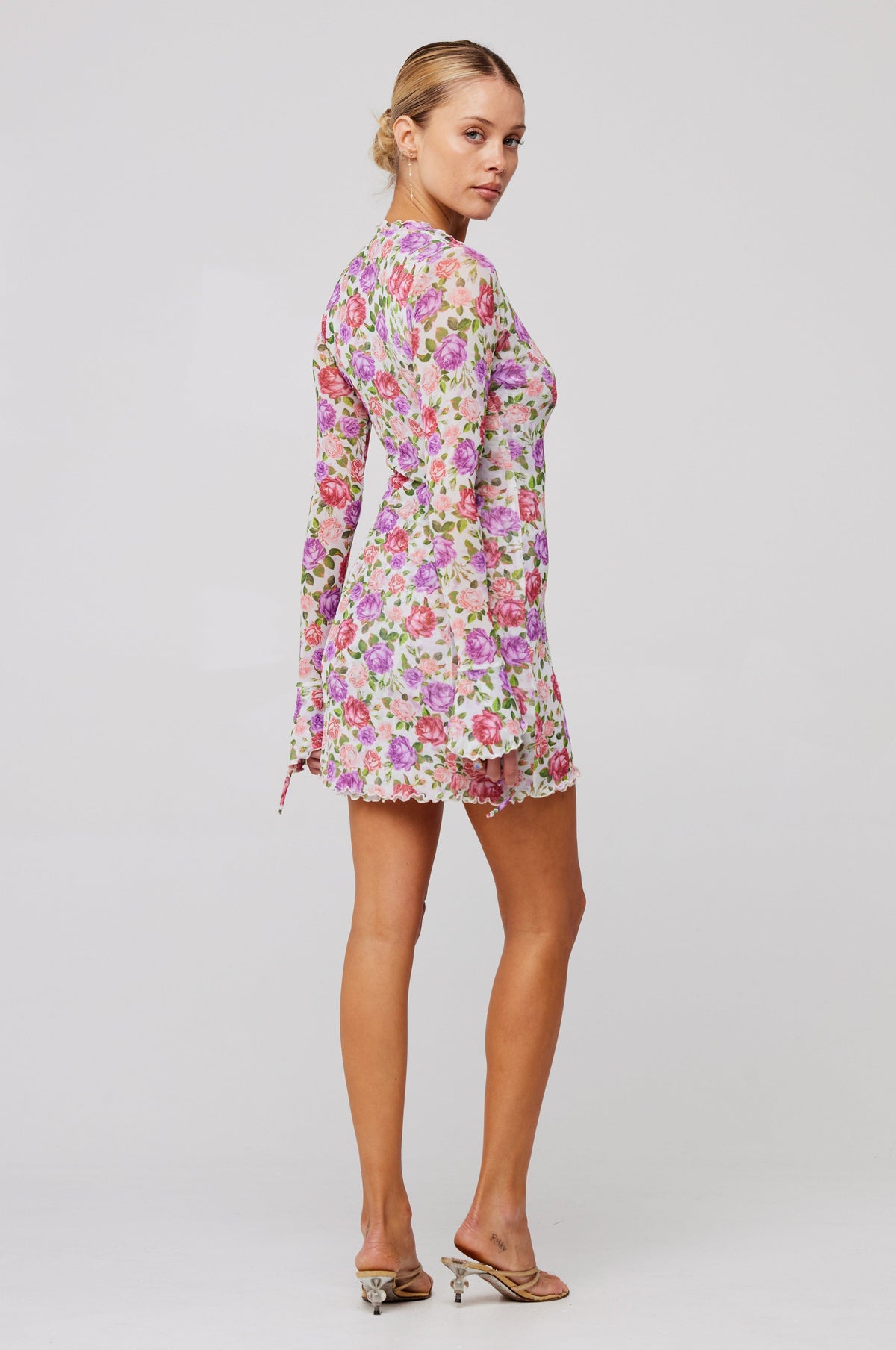 This is an image of Sloane Mini in Vintage Floral - RESA featuring a model wearing the dress