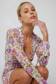This is an image of Sloane Mini in Vintage Floral - RESA featuring a model wearing the dress