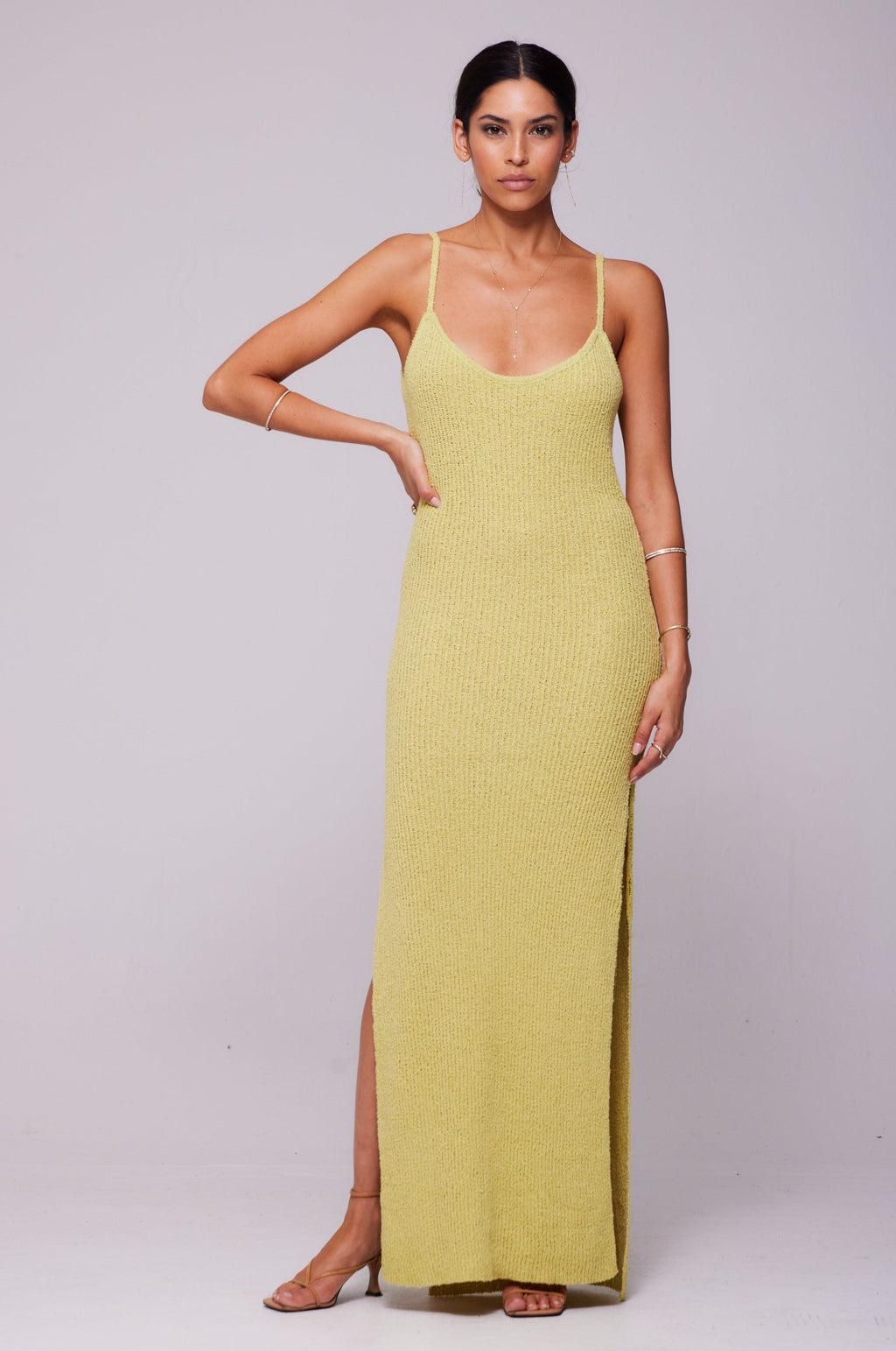 This is an image of Sohni Dress in Lime - RESA featuring a model wearing the dress