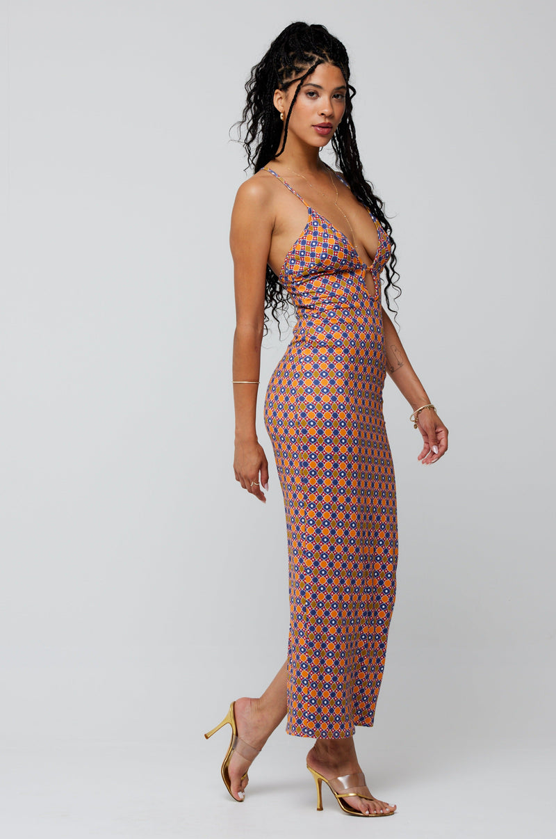 This is an image of Sophia Midi in Cortez - RESA featuring a model wearing the dress