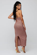 This is an image of Sophia Midi in Cortez - RESA featuring a model wearing the dress
