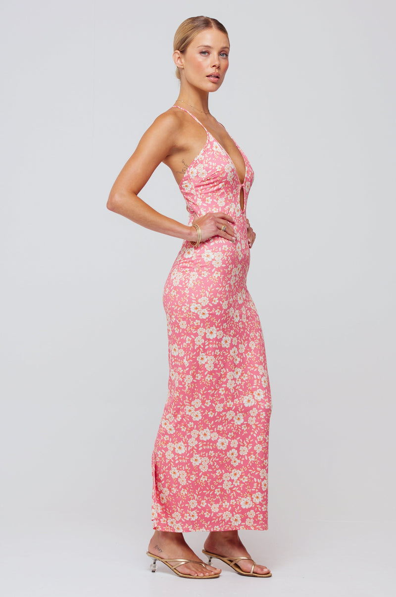 This is an image of Sophia Midi in Guava - RESA featuring a model wearing the dress