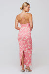 This is an image of Sophia Midi in Guava - RESA featuring a model wearing the dress