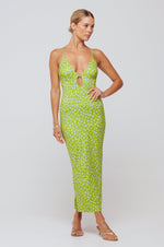This is an image of Sophia Midi in Kiwi - RESA featuring a model wearing the dress