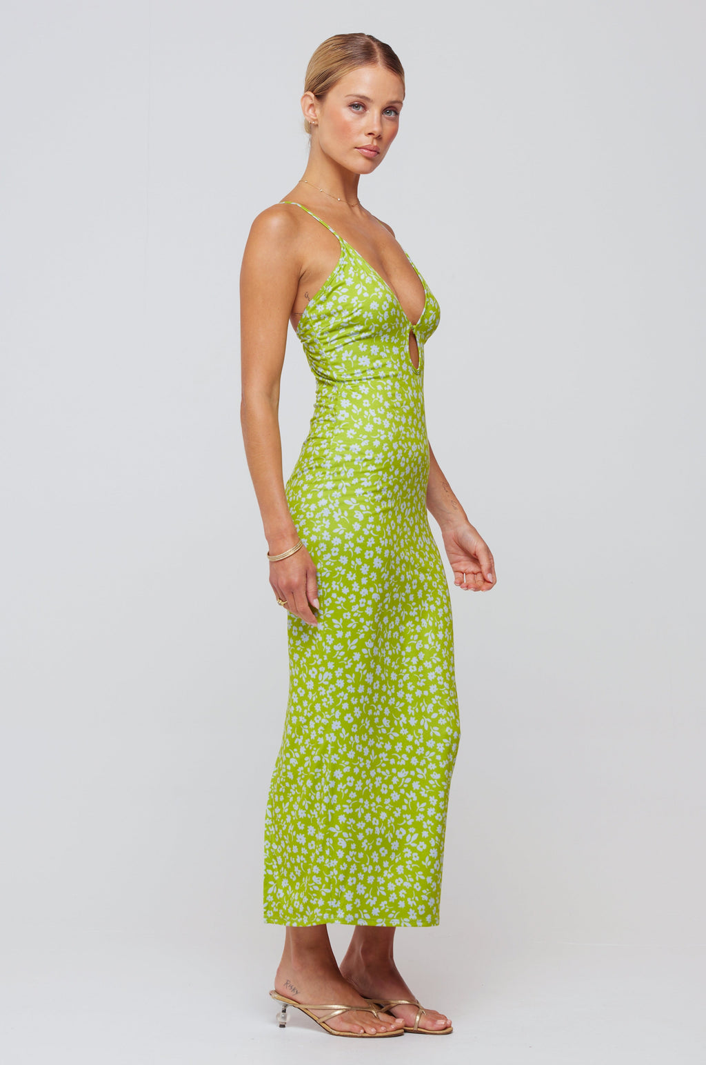 This is an image of Sophia Midi in Kiwi - RESA featuring a model wearing the dress