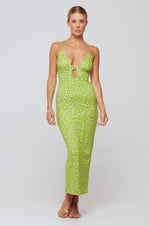 This is an image of Sophia Midi in Kiwi - RESA featuring a model wearing the dress