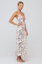 This is an image of Sophia Midi in Oahu - RESA featuring a model wearing the dress