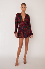 This is an image of Stevie Romper in Monarch - RESA featuring a model wearing the dress