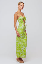 This is an image of Summer Midi in Kiwi - RESA featuring a model wearing the dress