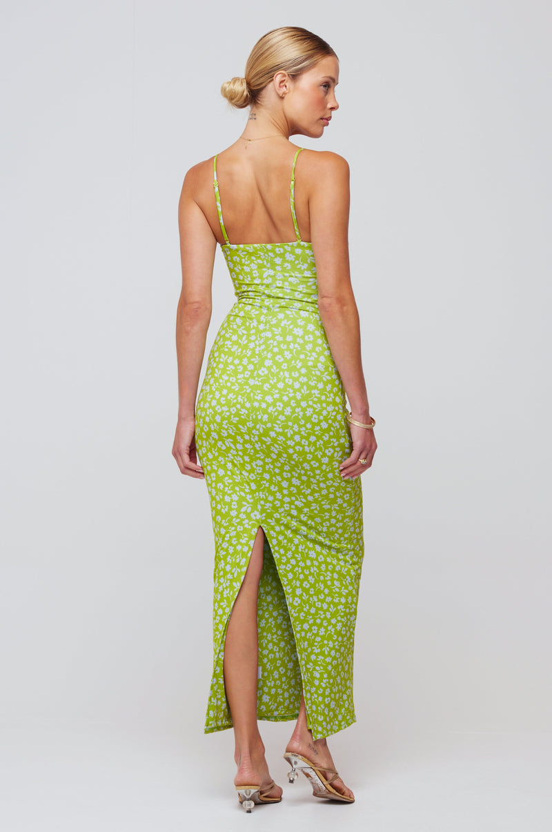 This is an image of Summer Midi in Kiwi - RESA featuring a model wearing the dress