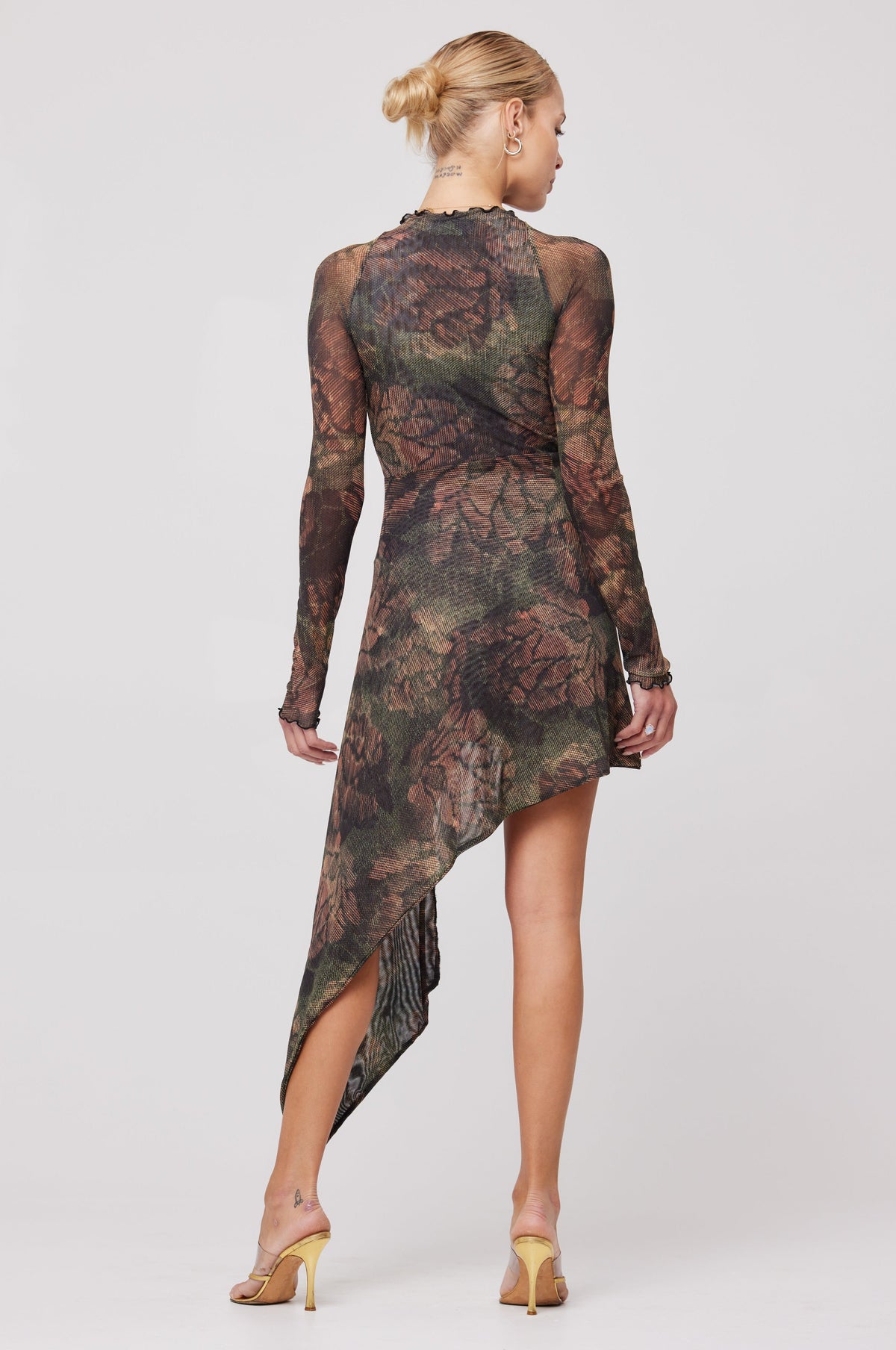 This is an image of Suzanne Mini in Autumn - RESA featuring a model wearing the dress