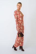This is an image of Twiggy Dress in Magnolia - RESA featuring a model wearing the dress