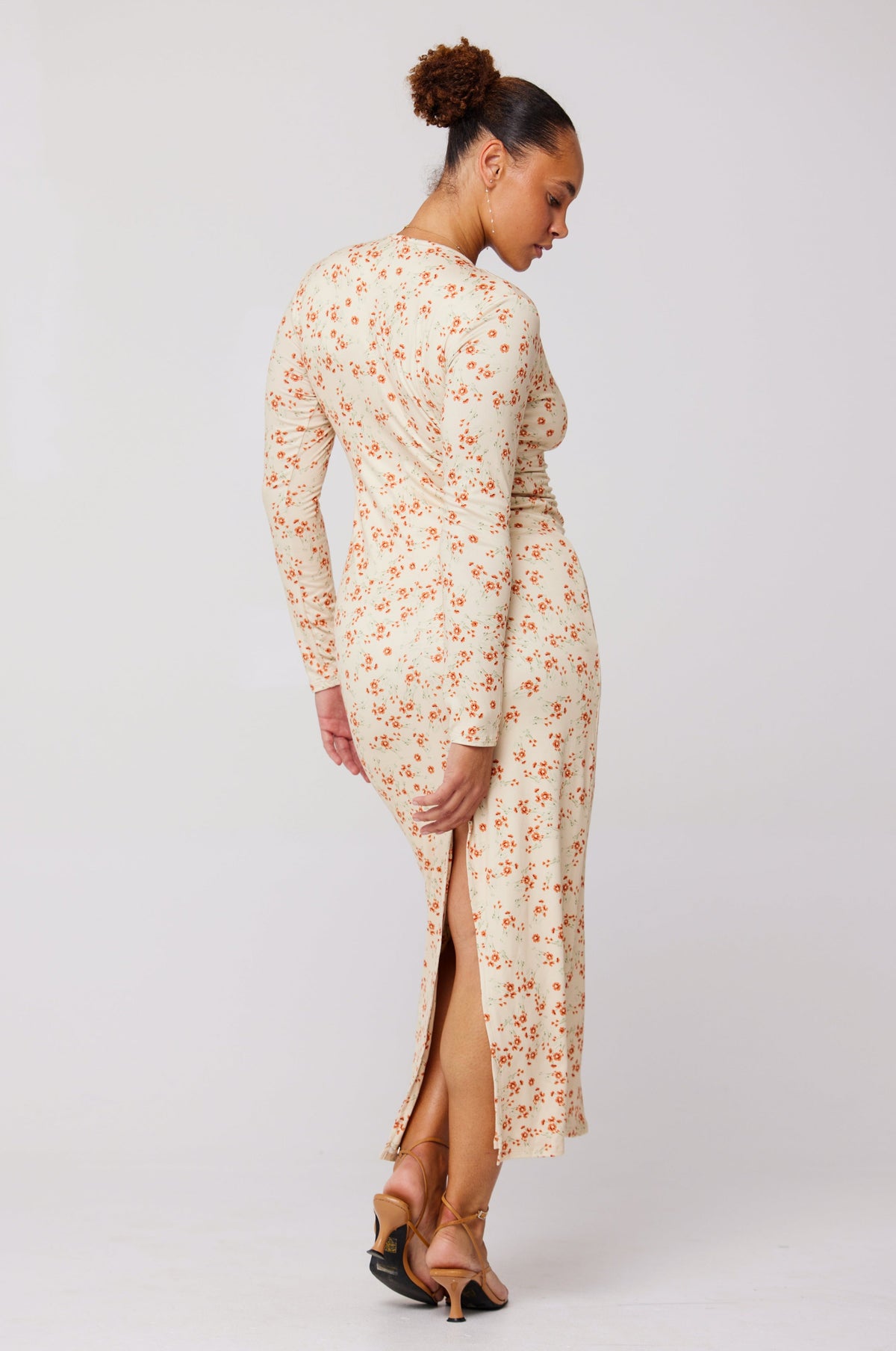 This is an image of Twiggy Dress in Wildflower - RESA featuring a model wearing the dress