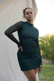 This is an image of Tyler Mini in Sparrow - RESA featuring a model wearing the dress