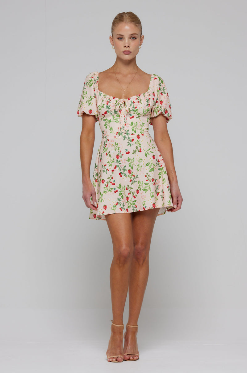 This is an image of Winnie Mini in Cherie - RESA featuring a model wearing the dress