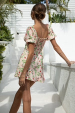 This is an image of Winnie Mini in Cherie - RESA featuring a model wearing the dress