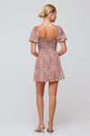 This is an image of Winnie Mini in Santana - RESA featuring a model wearing the dress