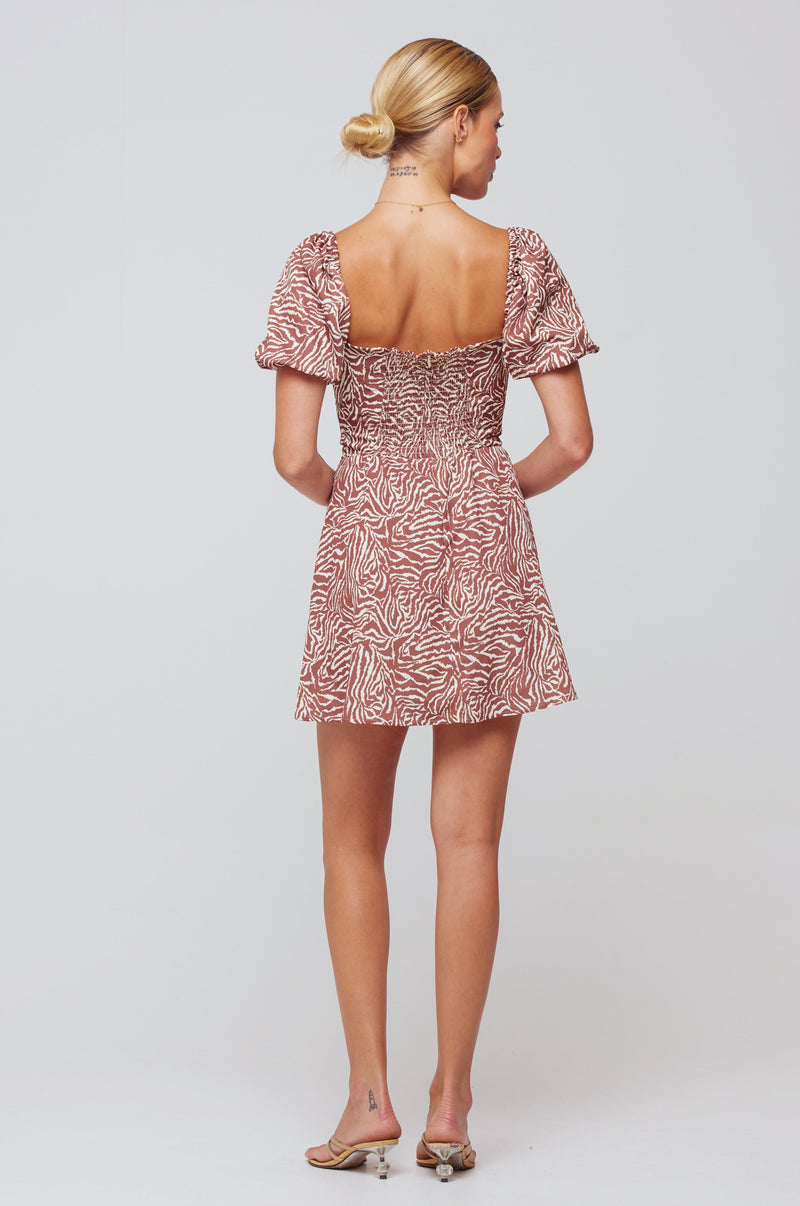This is an image of Winnie Mini in Santana - RESA featuring a model wearing the dress