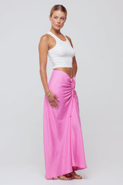 This is an image of Ziggy Skirt in Dragon Fruit - RESA featuring a model wearing the dress