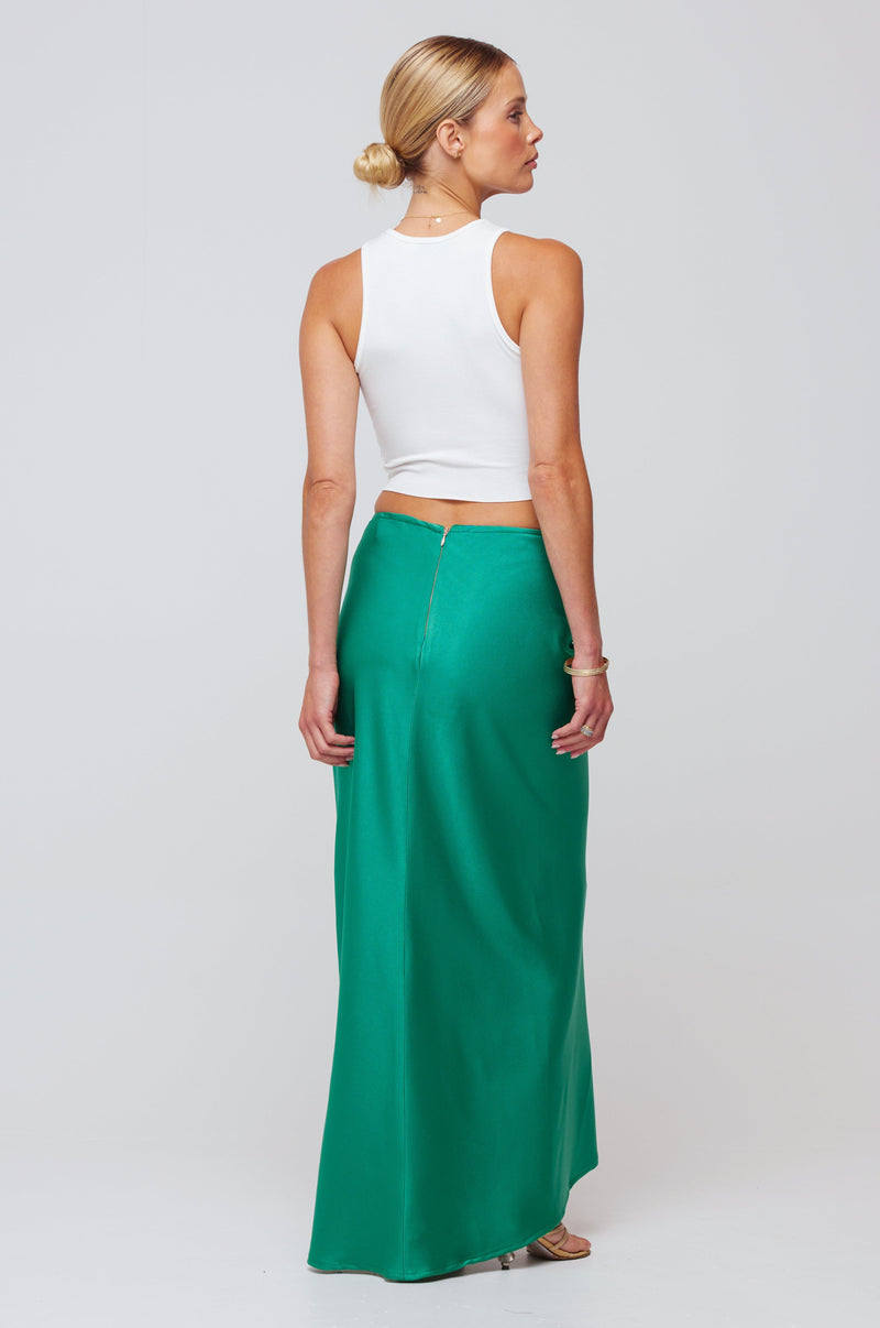 This is an image of Ziggy Skirt in Green - RESA featuring a model wearing the dress
