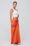 This is an image of Ziggy Skirt in Papaya - RESA featuring a model wearing the dress